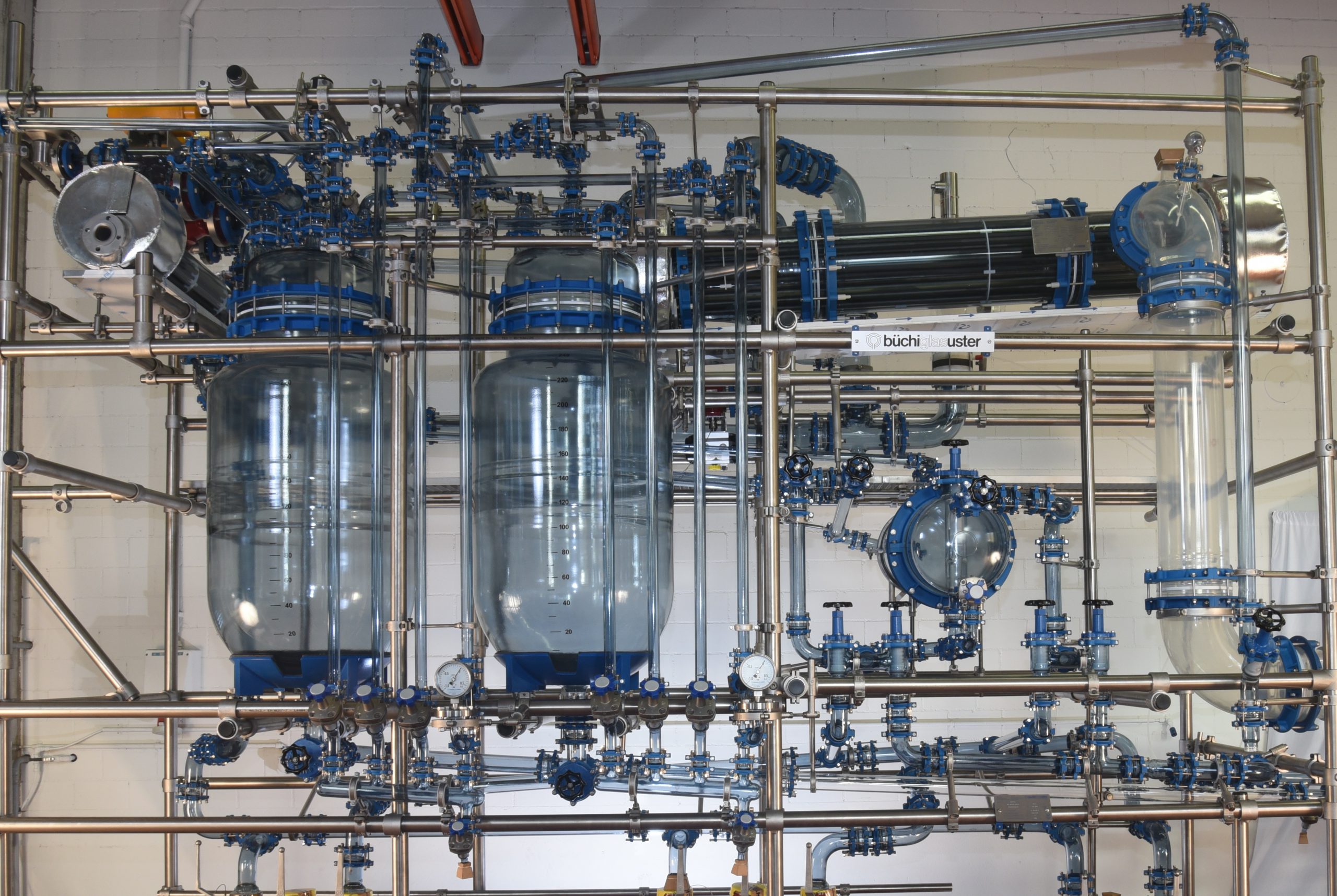 Vacuum distillation glass overhead with SiC shell & tube condensers for 2500 liter G/L reactor