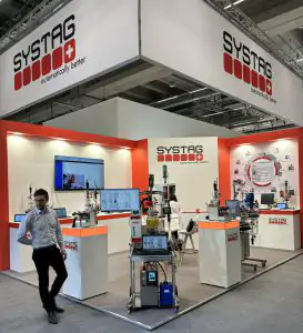 Systag Campari orange juice dosing reactor Systag automated lab reactor dosing Campari and orange juice at the exhibition